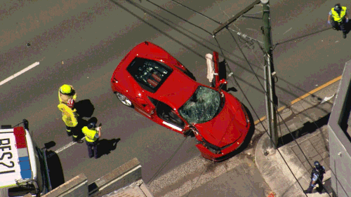 A Ferrari crashed into a power pole in St Peters this morning.