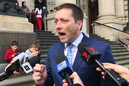 Opposition Coalition leader Matthew Guy told reporters governments should not keep ministers in office while police investigate them. Picture: AAP 