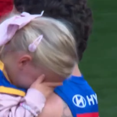 Lachie Neale with daughter Piper Neale