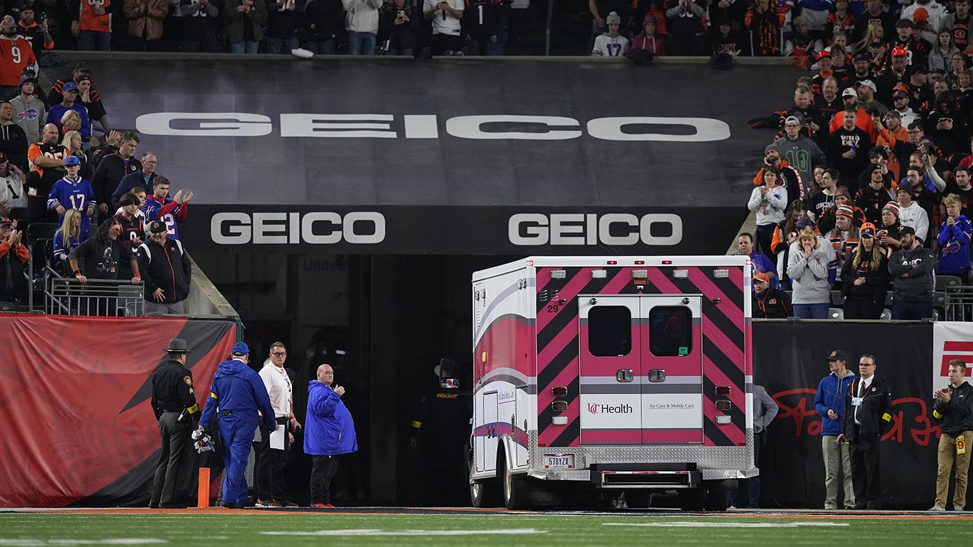 An ambulance carrying Damar Hamlin of the Buffalo Bills leaves the field after he collapsed after making a tackle against the Cincinnati Bengals.
