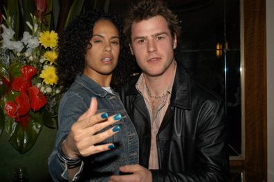 10 September 2003 - CHRISTINE ANU and RODGER CORSER at the after party for the opening night of the show Certified Male, at Her Majesty's Theatre. Melbourne, Victoria. (Photo by Regis Martin/Getty Images), Australia  *** Local Caption *** Christine Anu;Rodger Corser