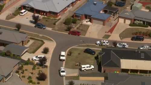 Police have established a crime scene outside a day care centre after a toddler died. (9NEWS)