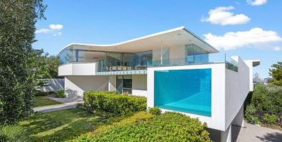 Dramatic see-through pool luxury home under offer four million City Beach Perth Western Australia Domain 