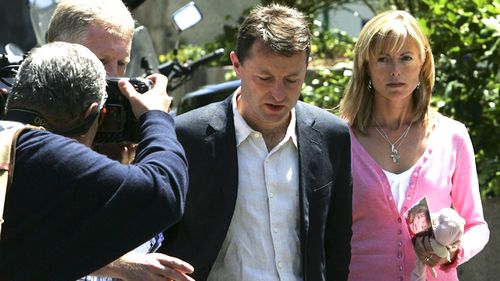 Kate and Gerry McCann in Madrid, Spain, four weeks after their daughter Madeleine Beth McCann vanished. Kate is holding Maddie's toy, Cuddle Cat. (Getty)