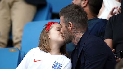 David Beckham with his daughter Harper at the Women's World Cup quarterfinal soccer match between Norway and England.