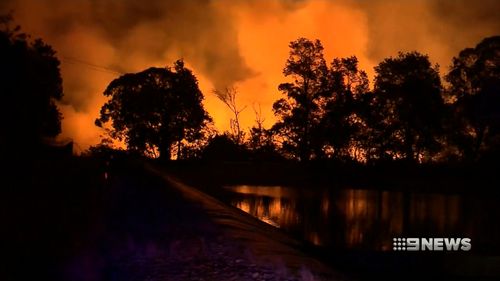 Fierce winds gusting up to 90km/h pushed the fire straight towards Tathra late yesterday, taking locals and emergency workers by surprise. Many had just minutes to escape. (Supplied)