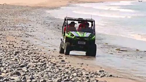 Police and SES workers will extend their search around the isolated beach.