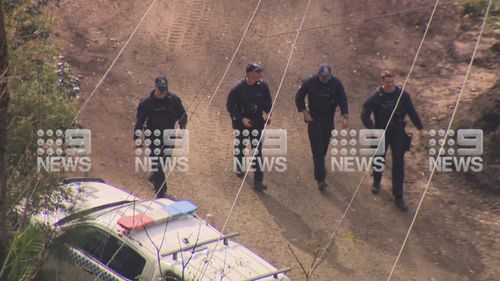 Acting Assistant Commissioner Paul Dunstan said police involved "feared for their lives" in the raid on a camp in Sydney's north west.