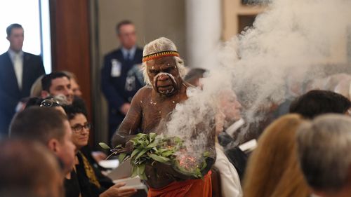A smoking ceremony was performed before the state funeral at St James Church in Sydney. (AAP)