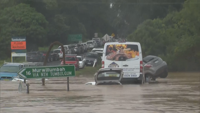 The small village of Tumbulgum in northern NSW is being hit by the severe flooding sweeping across parts of the state.