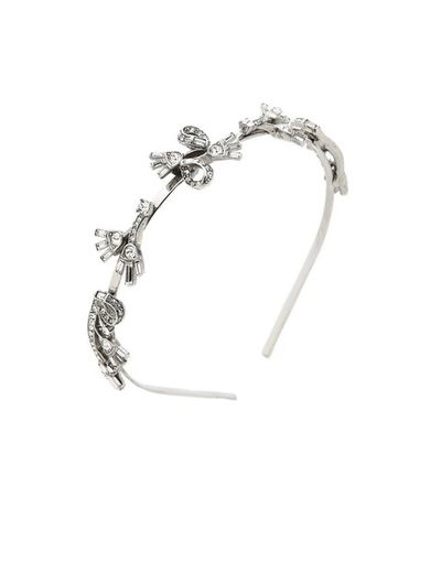 <a href="https://www.shopbop.com/floral-baguette-headband-oscar-renta/vp/v=1/1572109753.htm" target="_blank">Oscar de la Renta crystal headband, $648.</a><br>