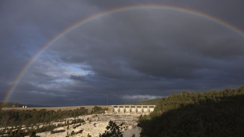 Yesterday the dam spilt after reaching almost 104 per cent capacity and made its way downriver.