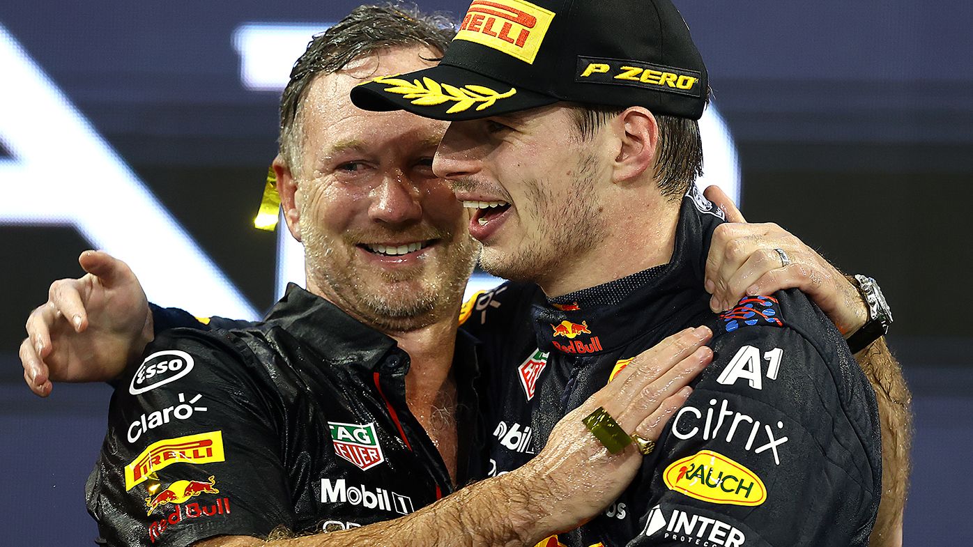 Christian Horner and Max Verstappen celebrate the Dutch driver claiming the world championship.