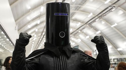 Lord Buckethead of the Monster Raving Loony Party poses for the media as ballot papers are counted at Britain's Prime Minister Boris Johnson's Uxbridge and South Ruislip constituency count declaration at Brunel University in Uxbridge, London.