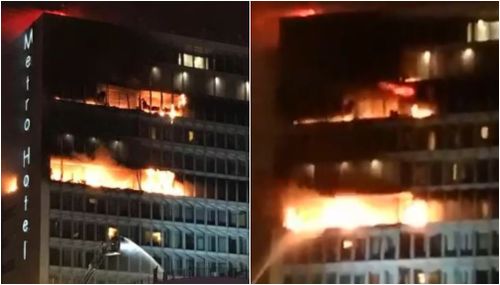 The fire is burning across multiple floors of the building. (Twitter)