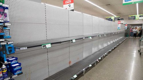 Empty toilet paper shelves in Woolworths, Wetherill Park, Sydney.