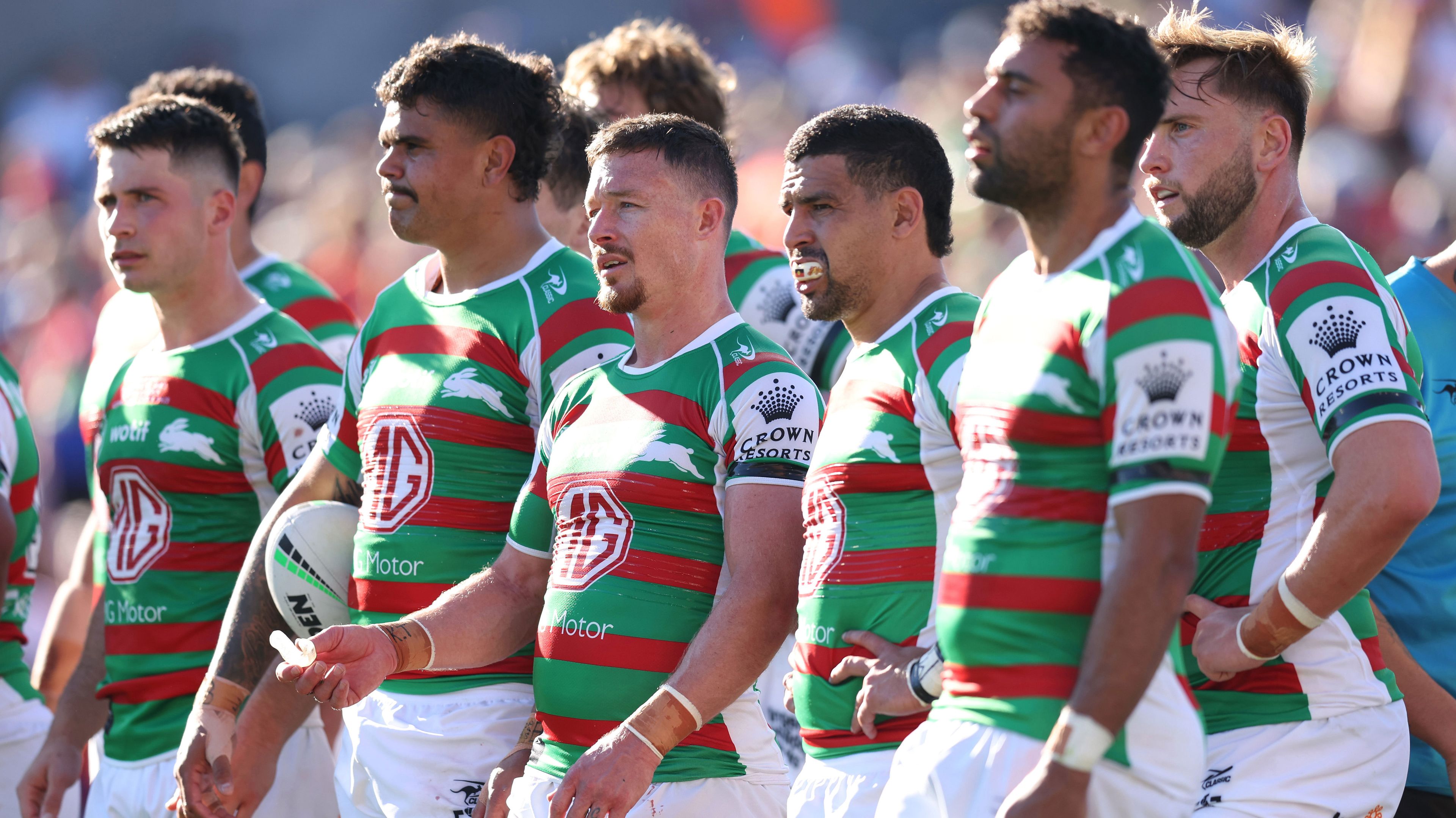 Souths players react to a Knights try during the round 25 match against the Newcastle Knights.