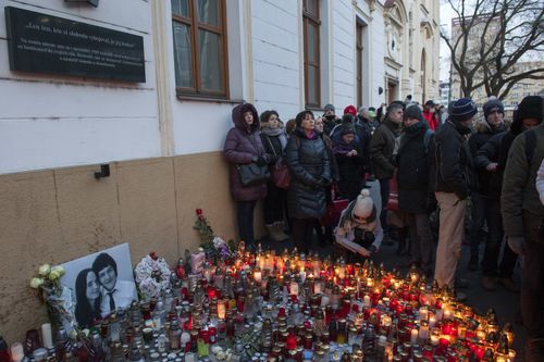 Hundreds of people gathered in the centre of Bratislava, Slovakia, February 28, 2018, carrying burning candles in commemoration of journalist Jan Kuciak and his girlfriend, who were murdered last week. The rally set off from the central SNP Square to the government seat. Further commemorative meetings are to take place in towns across Slovakia on Friday and Saturday, organised by civic activists. Photo/Martin Mikula (CTK via AP Images)