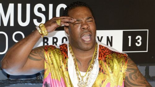 Busta Rhymes charged after allegedly throwing drink at gym worker