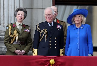 Princess Anne, Princess Royal, King Charles III and Queen Camilla on the balcony of Buckingham Palace during a fly-past to mark the 80th anniversary of VE Day on May 05, 2025 in London, England. 