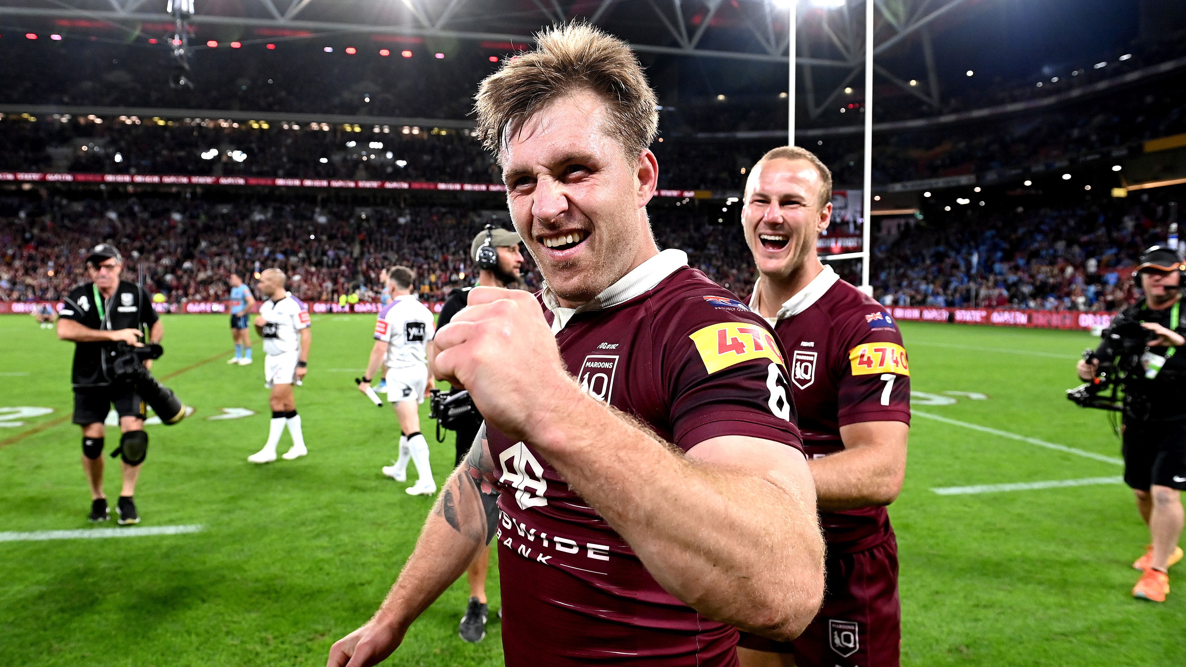 BRISBANE, AUSTRALIA - JUNE 21: Cameron Munster and Daly Cherry-Evans of Queensland celebrate victory after game two of the State of Origin series between the Queensland Maroons and the New South Wales Blues at Suncorp Stadium on June 21, 2023 in Brisbane, Australia. (Photo by Bradley Kanaris/Getty Images)