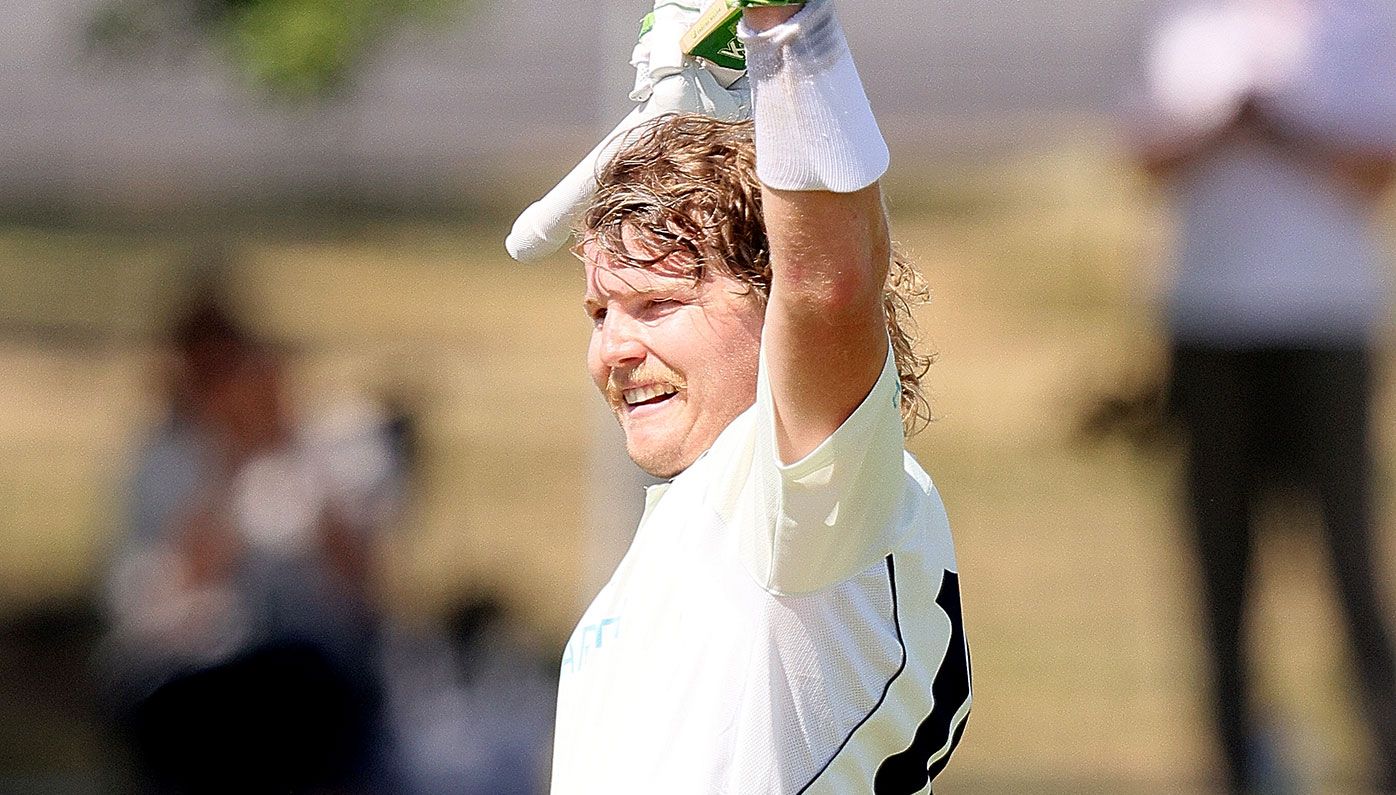 Will Pucovski celebrates after reaching his century against Western Australia.