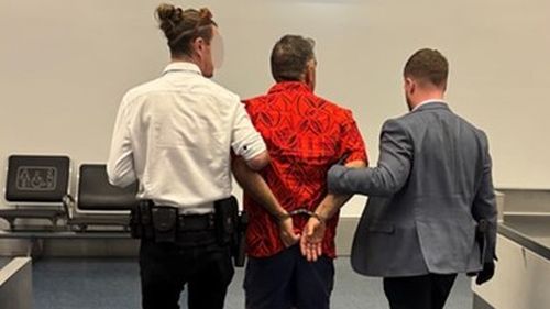 Aï»¿ 52-year-old man has been charged after a large amount of child abuse material was allegedly hidden in his underwear and shoes at Sydney Airport. 