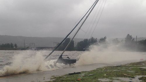 Boats were washed ashore in Gosford. (Laura Tunstall/9NEWS)
