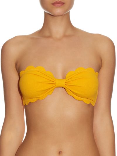Scallop-edged bikini top, $186, Marysia at <a href="http://www.matchesfashion.com/au/products/Marysia-Swim-Antibes-scallop-edged-bandeau-bikini-top%09-1051199" target="_blank">Matches </a><br />