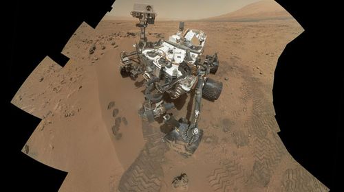 NASA's rover Curiosity may be joined by a reality TV settlement on Mars. (AAP)