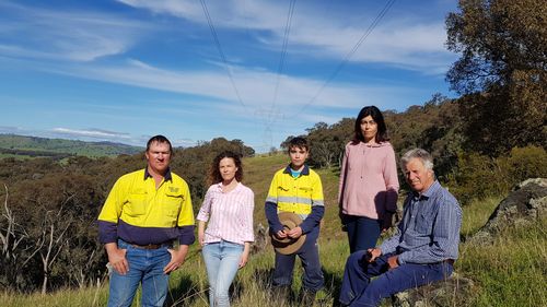 Rebecca Tobin, second from left, is one of the farmers speaking out against the line.