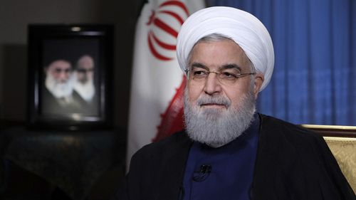 President Hassan Rouhani addresses the nation in a televised speech in Tehran, Iran. President Rouhani struck a hard line as the US restored some sanctions that had been lifted under the 2015 nuclear deal. (AAP)