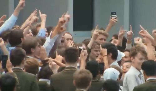 Students refused to let the much-loved teacher go quietly, staging protests at the school to "Bring back Brownie."