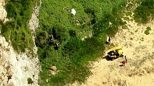 She was safely brought to the base of the cliff. (9NEWS)