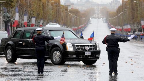 President Donald Trump's motorcade turns onto the Champs Elysees in Paris, France.