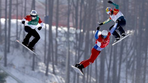 Australian snowboarder Jarryd Hughes was up against some tough opposition when he raced in the final of the snowboard cross today at the Pyeongchang Winter Olympics (AAP).