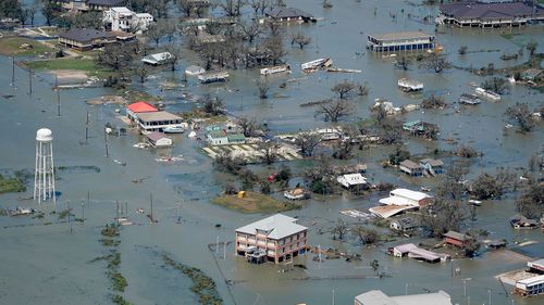 Buildings and homes are flooded in the aftermath of Hurricane Laura  on Aug. 27 near Lake Charles, La.