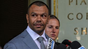 Kurtley Beale enters Downing Centre courts in Sydney.
