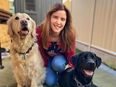 Rachael leahcar with her guide dogs ella and jarvis