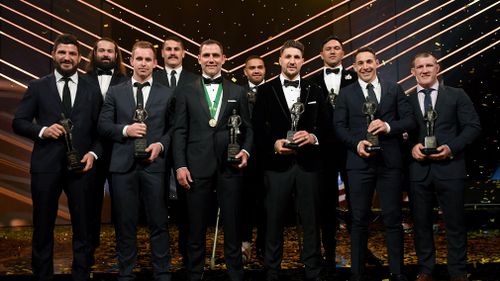 Members of the NRL team of the year pose for a photograph at the Dally M Awards. (AAP)