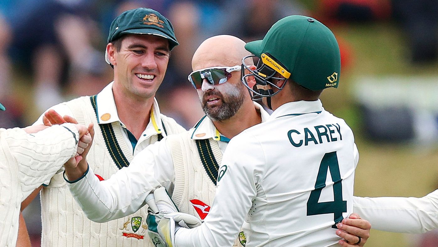 Nathan Lyon of Australia celebrates after taking the wicket of Glenn Phillips of New Zealand for a five wicket bag during day four of the First Test in the series between New Zealand and Australia at Basin Reserve on March 03, 2024 in Wellington, New Zealand. (Photo by Hagen Hopkins/Getty Images)