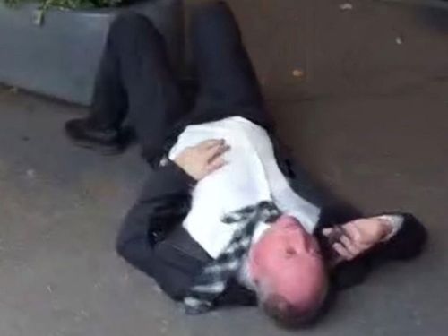 Barnaby Joyce was filmed lying and swearing on a Canberra street, prompting speculation as to how he had fallen off a planter box.