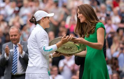 July 10: Ashleigh Barty of Australia is presented with the Venus Rosewater Dish trophy by HRH Catherine, The Duchess of Cambridge after winning her Ladies' Singles Final match against Karolina Pliskova of The Czech Republic on Day Twelve of The Championships - Wimbledon 2021 at All England Lawn Tennis and Croquet Club on July 10, 2021 in London, England.