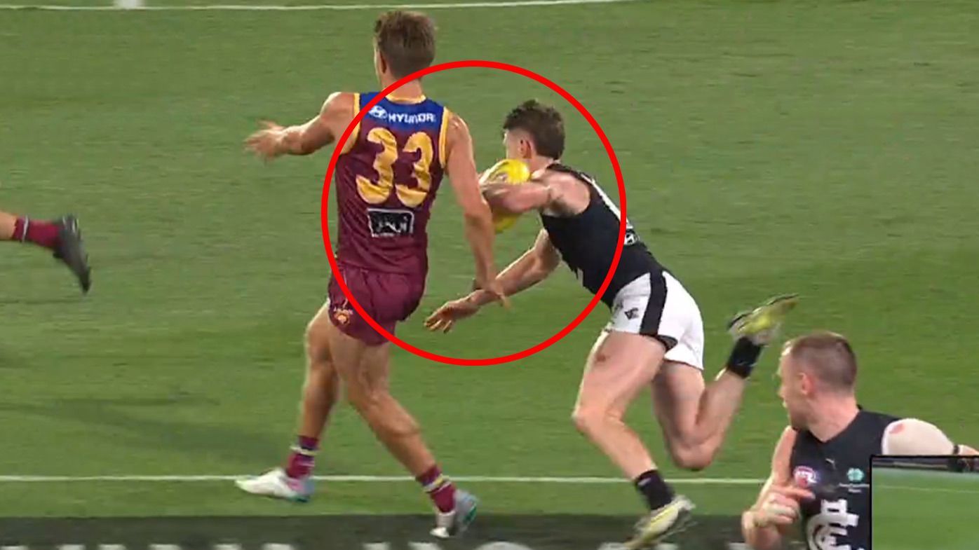 Sam Walsh tripping over Zac Bailey.