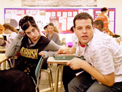 Lizzy Caplan and Daniel Franzese as Janis Ian and Damian Hubbard in 2004