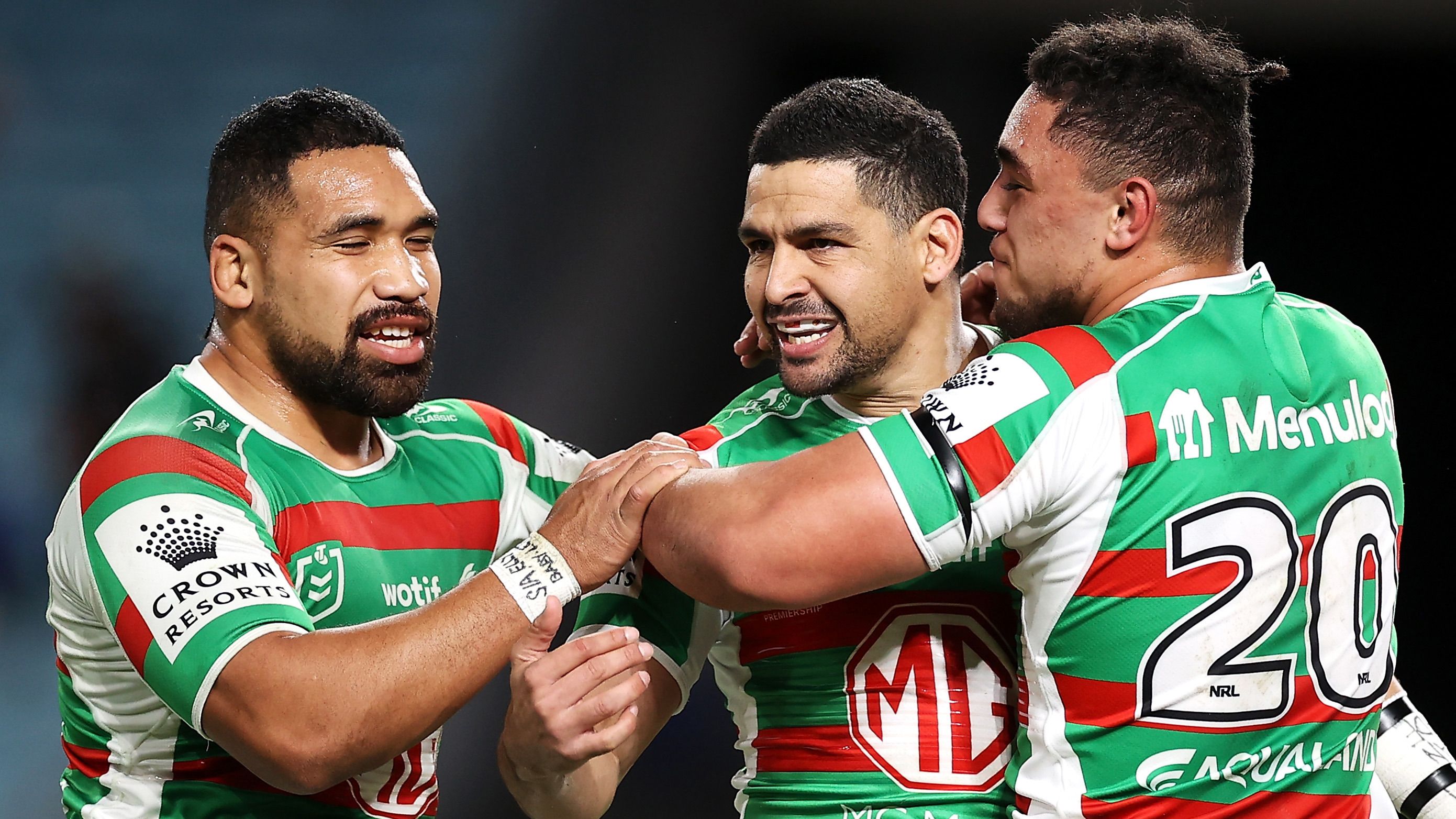 Cody Walker of the Rabbitohs celebrates with his team mates Siliva Havili and Davvy Moale of the Rabbitohs after scoring a tryduring the round 18 NRL match between the Canterbury Bulldogs and the South Sydney Rabbitohs at Stadium Australia, on July 17, 2022, in Sydney, Australia. (Photo by Mark Kolbe/Getty Images)