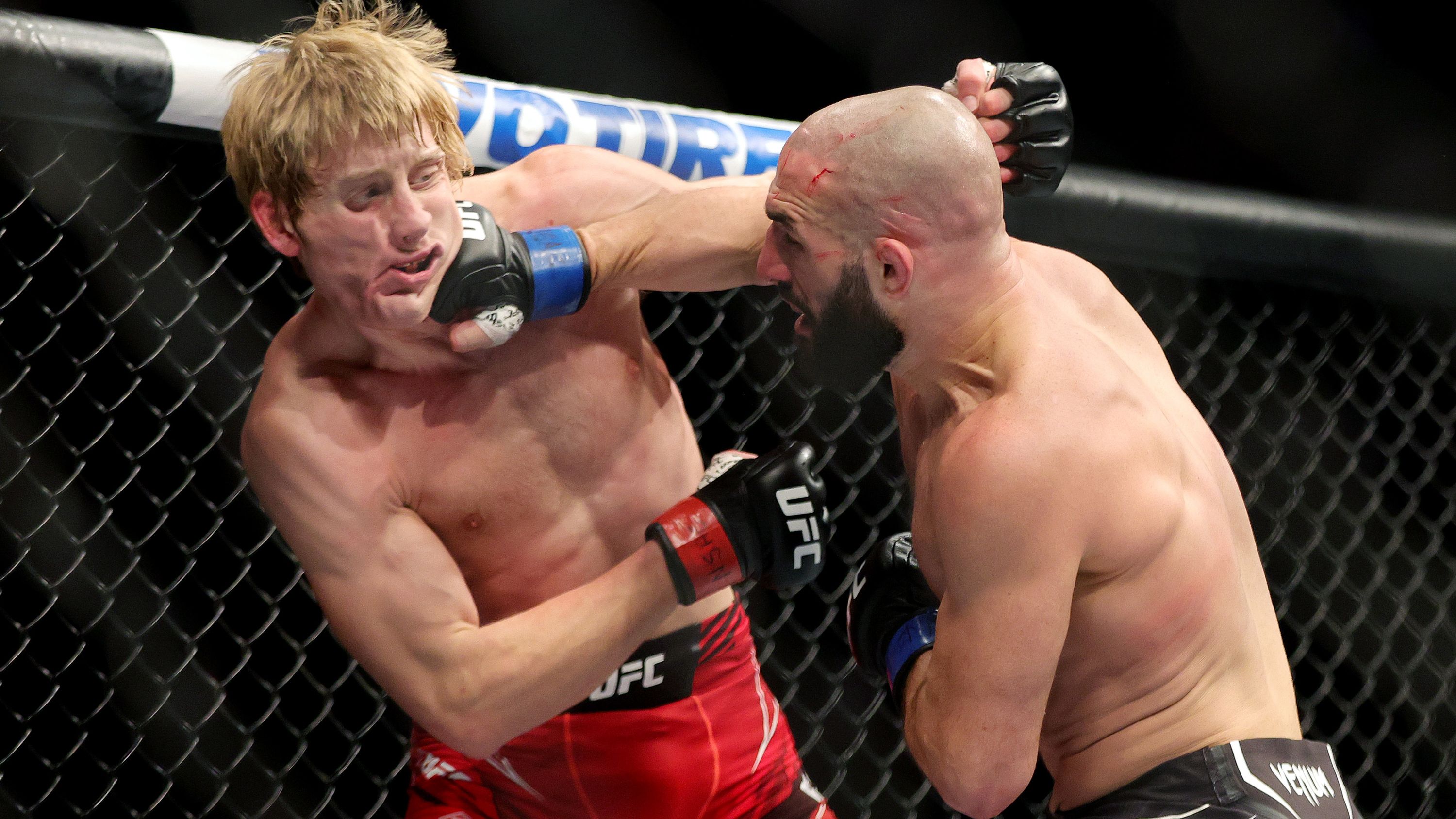 Jared Gordon punches Paddy Pimblett in a lightweight fight during the UFC 282 event.