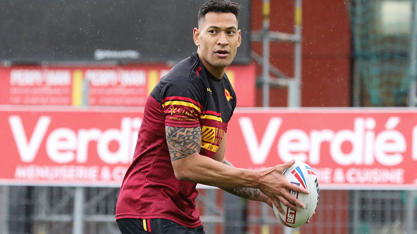 Australian rugby player Israel Folau prepares to pass the ball during a training session with his new club Catalan Dragons in Perpignan