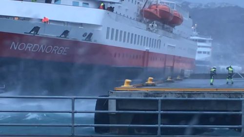 The cruise ship nearly colliding with the pier.