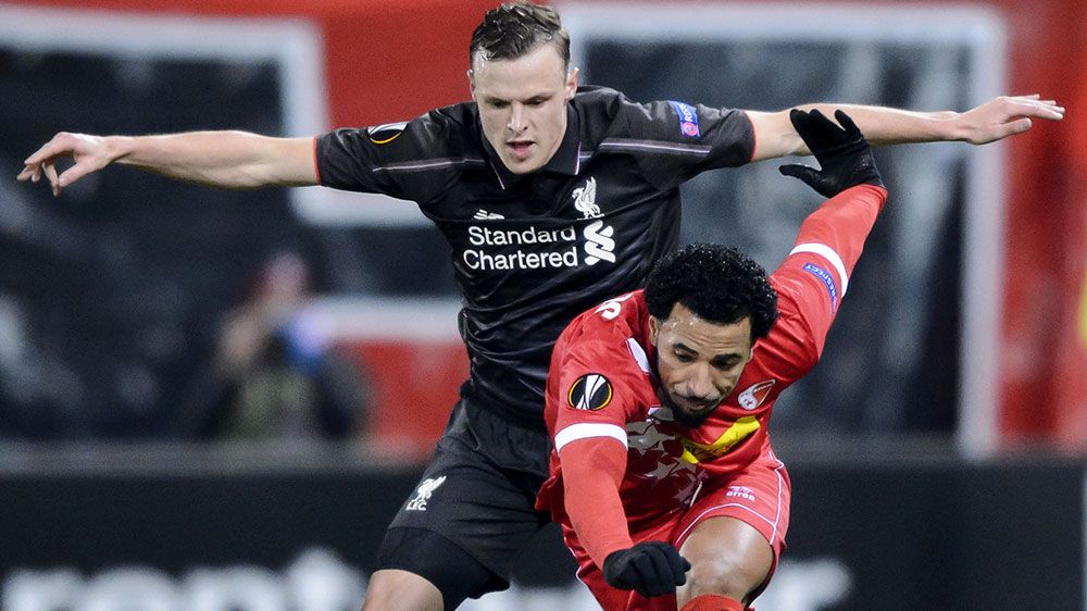 Liverpool's Australian defender Brad Smith (L) and Sion's Portugese midfielder Carlitos vie for the ball. (AFP)